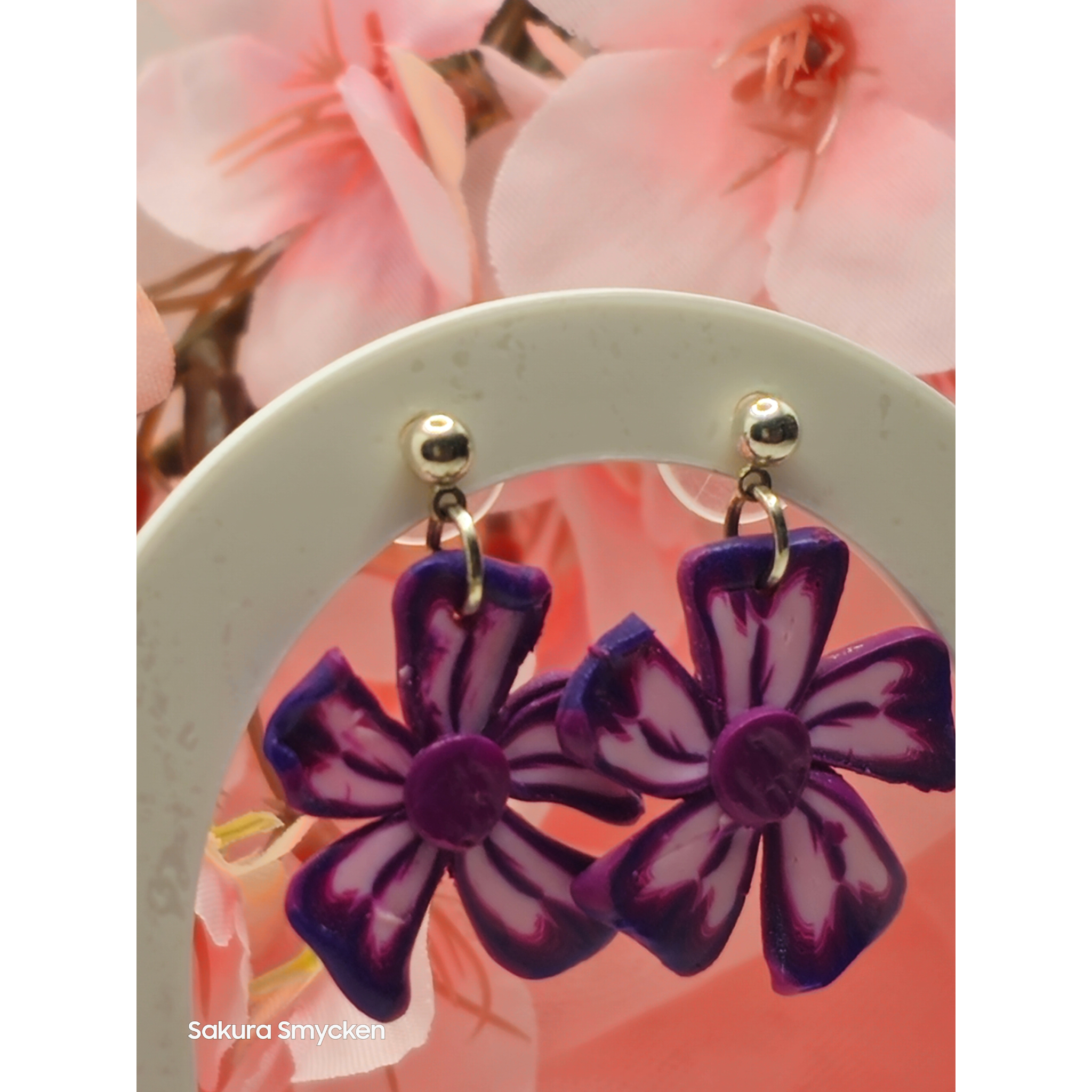 Blomörhängen i Polymerlera